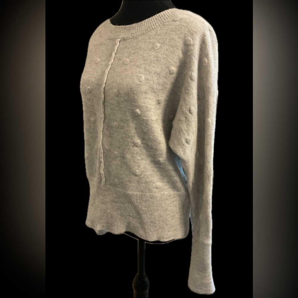 ***Shrinking Violet** Light Gray Women's Sweater with open V-neck back .